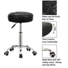 Black PU leather rolling stool chair by Global Star: Adjustable height and comfortable seating for office, salon, or spa.