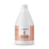 Globalstar Pure Acetone 3.78L on warm-toned nail salon station with cotton pads, nail files, cuticle pushers, dropper serum and full nail polish display shelves in background
