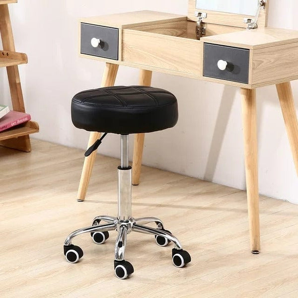 Black PU leather rolling stool chair by Global Star: Adjustable height and comfortable seating for office, salon, or spa.