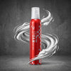 Red foam can with white nozzle on a dark background