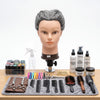 Globalstar 613/1B grey mannequin training head on clamp mount at professional Cosmetology Academy training station with colour swatches, scissors and styling tools