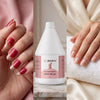 Globalstar Nail Polish Remover 3.78L on cream beige background with gold cuticle nippers, pushers, cotton pads and glass jar in elegant flat lay